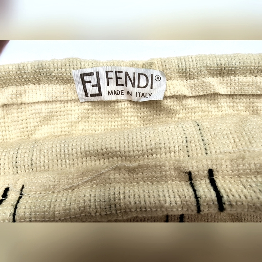 3 dust bags, 1 Fendi, 2 Fiore